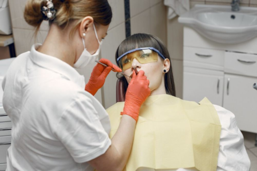Dentists remove tartar